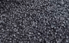 Flame-retardant engineering plastic components used in automotive, electrical, and industrial applications comparing halogenated and non-halogenated material systems.
