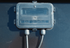 Solar junction box mounted on a photovoltaic panel using durable XYRON™ resin for weather resistance and electrical safety.