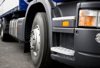 Heavy trucks on the road representing advanced polymer material opportunities for heavy truck components.