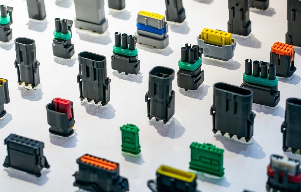 Halogen-free plastic electrical connectors showing molded housings with laser markings used in automotive and industrial applications.